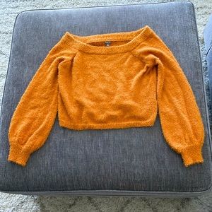 Golden Charlotte Russe off-shoulder eyelash sweater